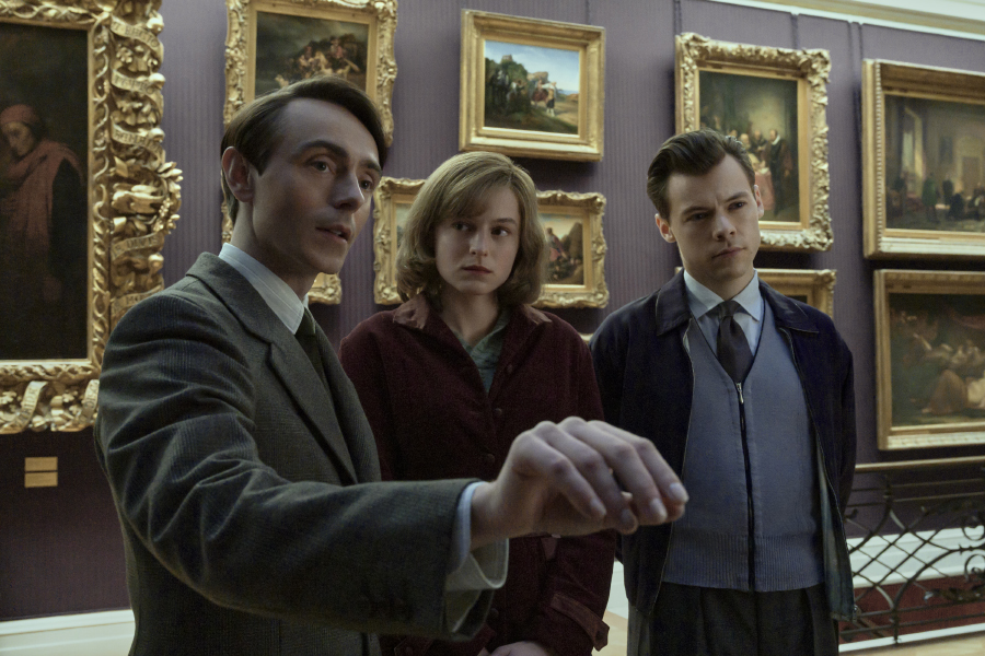 David Dawson, Emma Corrin and Harry Styles looking at art in My Policeman.